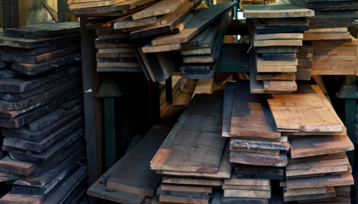 Reclaimed antique oak floor boards cut and stacked in our Hertfordshire workshop