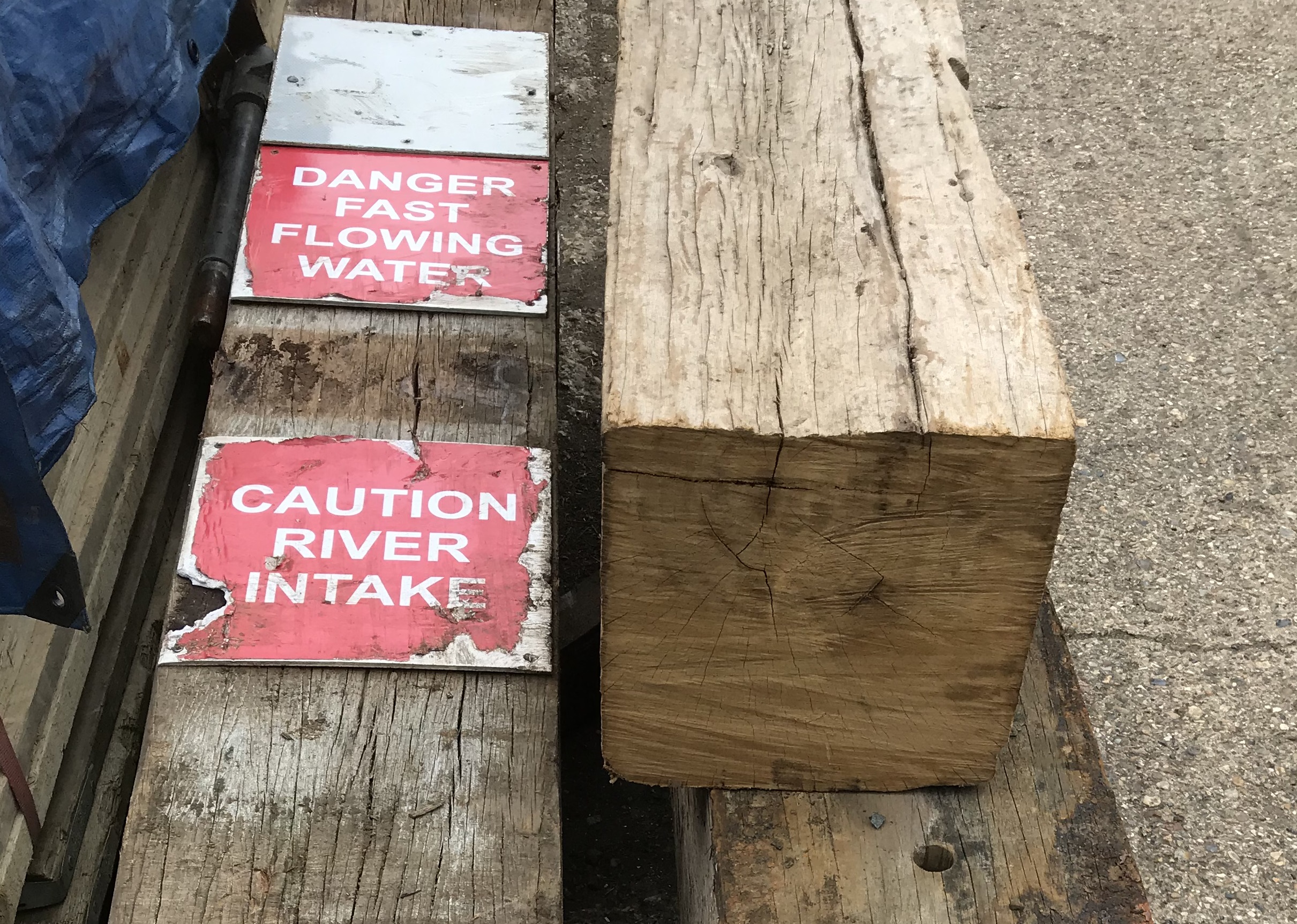 reclaimed jarrah beams with signage nailed in
