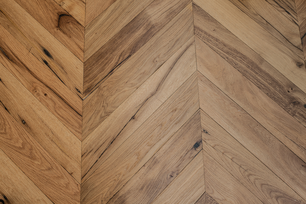 reclaimed pine solid wood flooring chevron parquet close up view