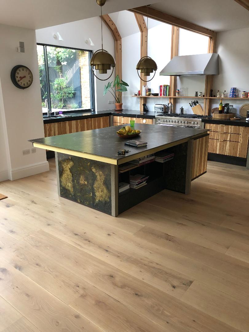 solid wood flooring over underfloor heating in kitchen, using pine